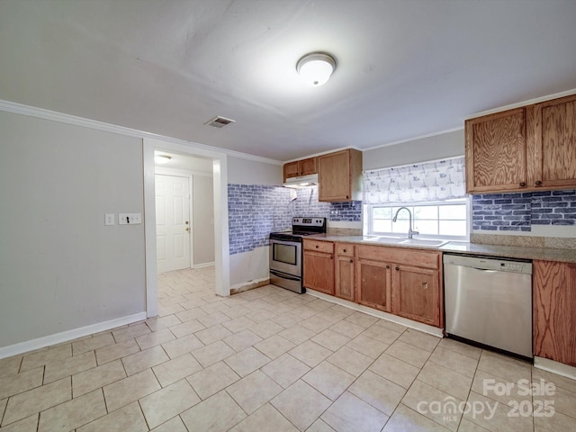 363 Sowers Rd, Linwood, NC 27299 - kitchen featuring appliances with stainless steel finishes, a sink, baseboards, ornamental molding, and decorative backsplash