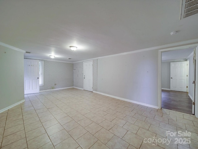 363 Sowers Rd, Linwood, NC 27299 - unfurnished room with crown molding, baseboards, light tile patterned floors, and a smoke detector