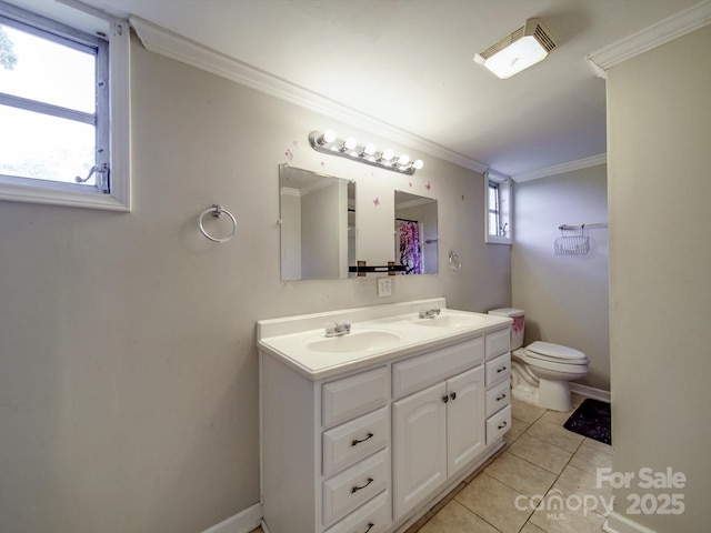 363 Sowers Rd, Linwood, NC 27299 - bathroom with double vanity, ornamental molding, toilet, and tile patterned flooring
