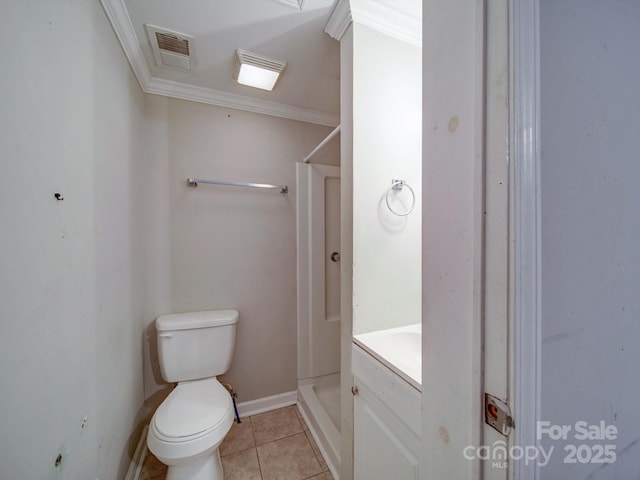 363 Sowers Rd, Linwood, NC 27299 - bathroom with toilet, a shower, tile patterned flooring, crown molding, and baseboards