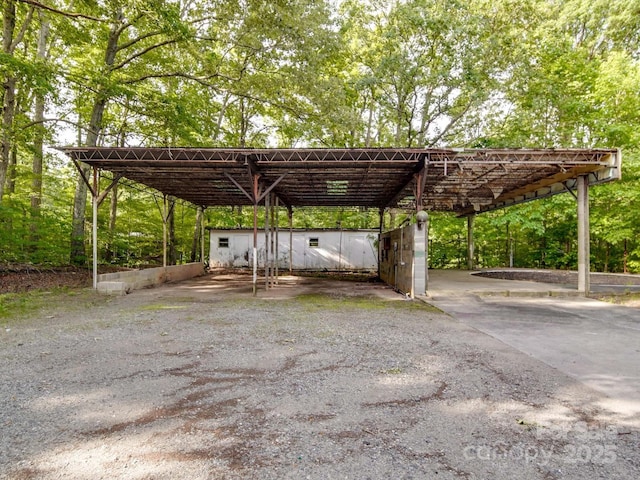 363 Sowers Rd, Linwood, NC 27299 - view of parking / parking lot featuring a carport