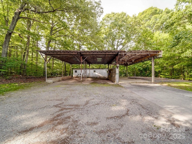 363 Sowers Rd, Linwood, NC 27299 - view of car parking featuring a detached carport and driveway