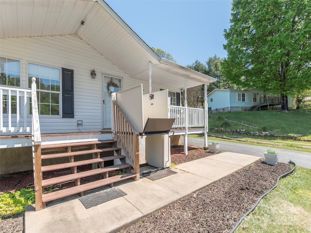 9 Redmond Dr, Alexander, NC 28701 - view of exterior entry featuring a lawn