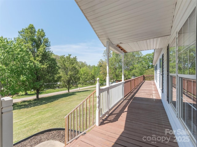 9 Redmond Dr, Alexander, NC 28701 - wooden deck featuring a lawn