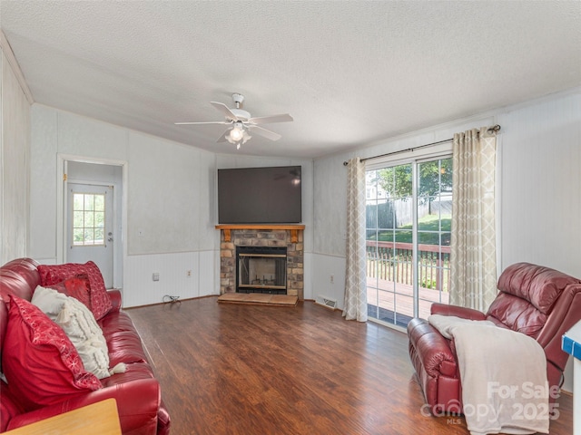 9 Redmond Dr, Alexander, NC 28701 - living area with a textured ceiling, visible vents, wood finished floors, and ceiling fan
