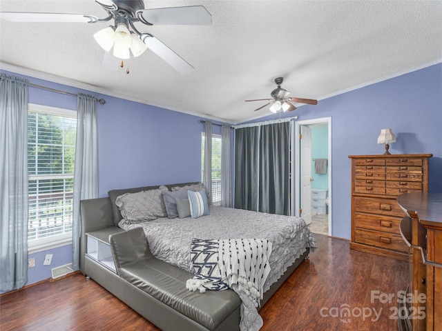 9 Redmond Dr, Alexander, NC 28701 - bedroom with crown molding, a textured ceiling, and wood finished floors