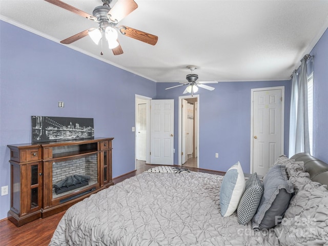 9 Redmond Dr, Alexander, NC 28701 - bedroom featuring baseboards, ceiling fan, crown molding, and dark wood-type flooring