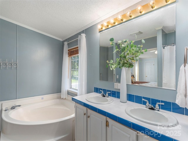 9 Redmond Dr, Alexander, NC 28701 - bathroom with a bath, a textured ceiling, crown molding, and a sink