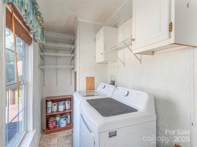 9 Redmond Dr, Alexander, NC 28701 - laundry area with washing machine and clothes dryer, a textured ceiling, and cabinet space