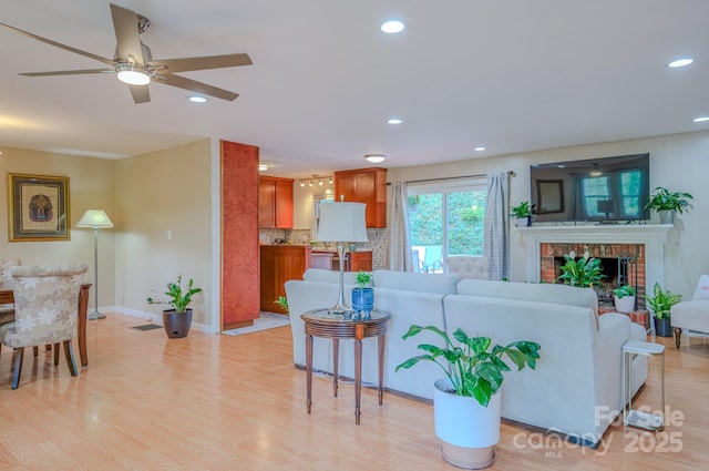 6 Chipmunk Cove Rd, Asheville, NC 28804 - living area featuring a ceiling fan, a brick fireplace, light wood-type flooring, baseboards, and recessed lighting