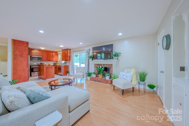 6 Chipmunk Cove Rd, Asheville, NC 28804 - living area with a brick fireplace, light wood-type flooring, and recessed lighting