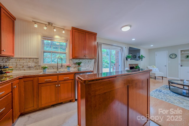 6 Chipmunk Cove Rd, Asheville, NC 28804 - kitchen with a sink, tasteful backsplash, and plenty of natural light