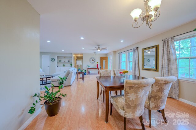 6 Chipmunk Cove Rd, Asheville, NC 28804 - dining area featuring baseboards, light wood-style flooring, ceiling fan with notable chandelier, and recessed lighting