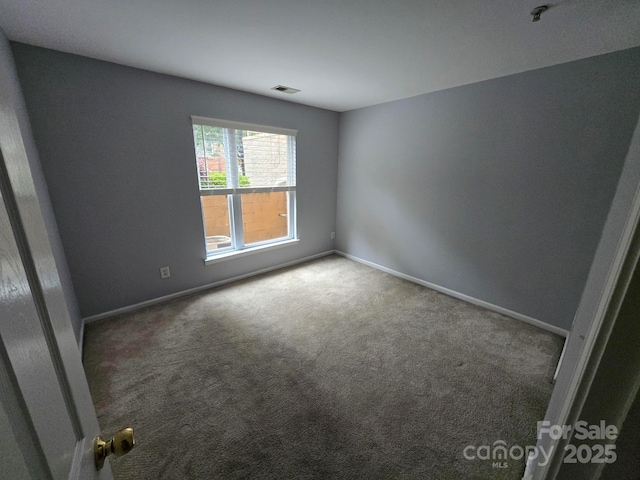 521 Donatello Ave, Charlotte, NC 28205 - empty room with carpet and baseboards