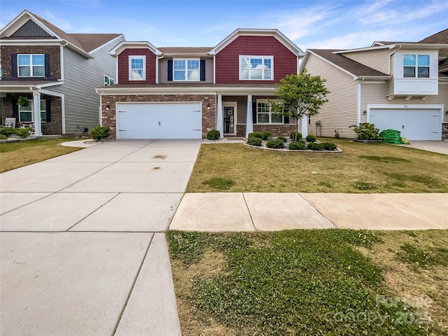 craftsman inspired home with covered porch, an attached garage, brick siding, concrete driveway, and a front yard