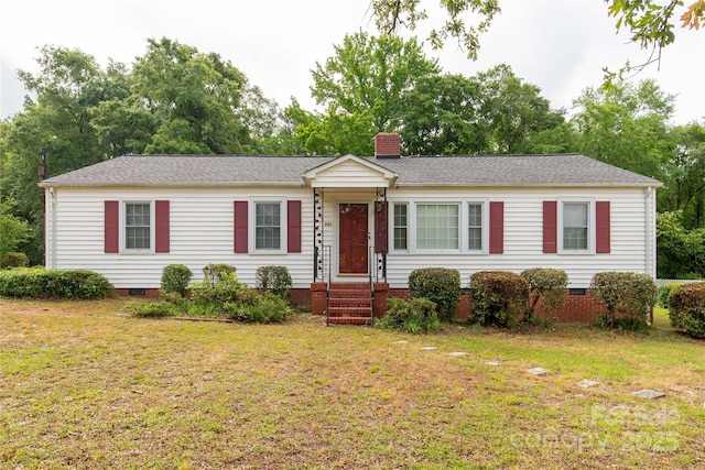 single story home featuring crawl space, a front lawn, and a chimney