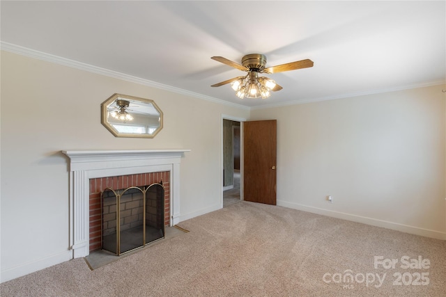 unfurnished living room featuring ornamental molding, carpet, a fireplace, a ceiling fan, and baseboards