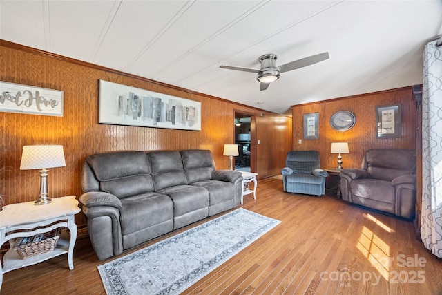 105 Carrie Ln Unit 3, Cherryville, NC 28021 - living room with ornamental molding, wooden walls, wood-type flooring, and a ceiling fan
