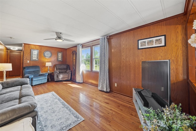 105 Carrie Ln Unit 3, Cherryville, NC 28021 - living room with wood walls, baseboards, light wood-style flooring, and a ceiling fan