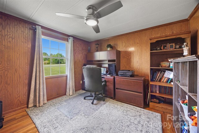 105 Carrie Ln Unit 3, Cherryville, NC 28021 - office area featuring a textured ceiling, baseboards, ceiling fan, wood walls, and wood finished floors