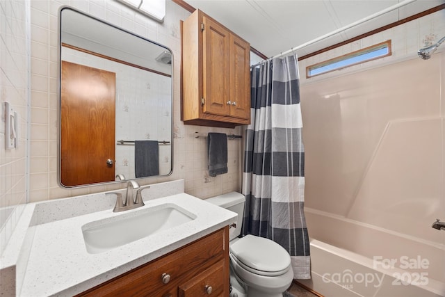 105 Carrie Ln Unit 3, Cherryville, NC 28021 - full bathroom featuring shower / bath combination with curtain, toilet, tile walls, backsplash, and vanity