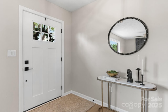 606 Hillcrest St, Hudson, NC 28638 - entrance foyer featuring baseboards and a healthy amount of sunlight