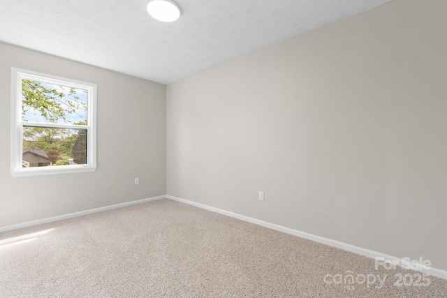606 Hillcrest St, Hudson, NC 28638 - carpeted empty room featuring baseboards