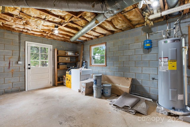 606 Hillcrest St, Hudson, NC 28638 - basement with electric water heater, a wealth of natural light, and concrete block wall