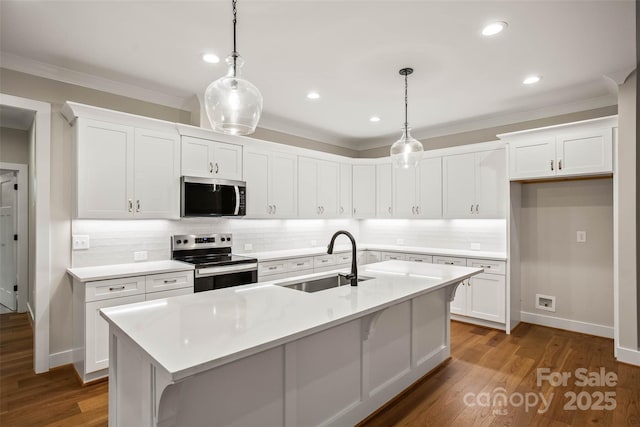 kitchen with tasteful backsplash, ornamental molding, a sink, stainless steel appliances, and white cabinets