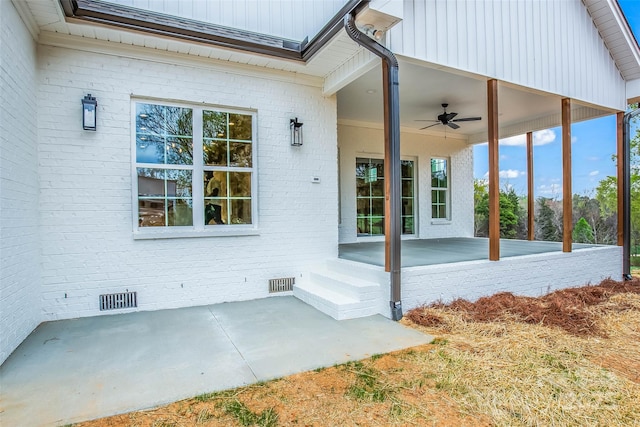 view of patio featuring visible vents and ceiling fan