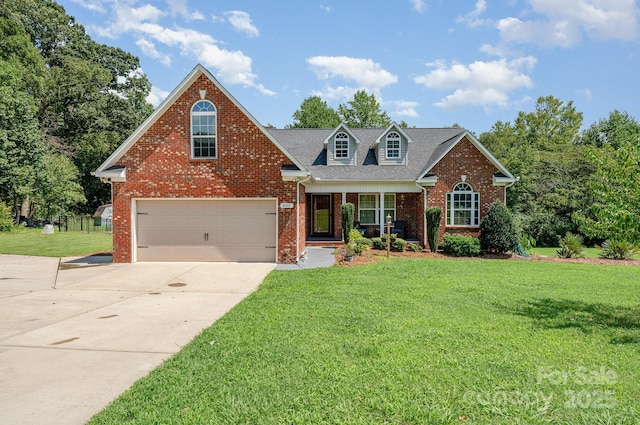 600 Old Hardin Rd, Dallas, NC 28034 - traditional-style home featuring driveway, brick siding, covered porch, an attached garage, and a front lawn