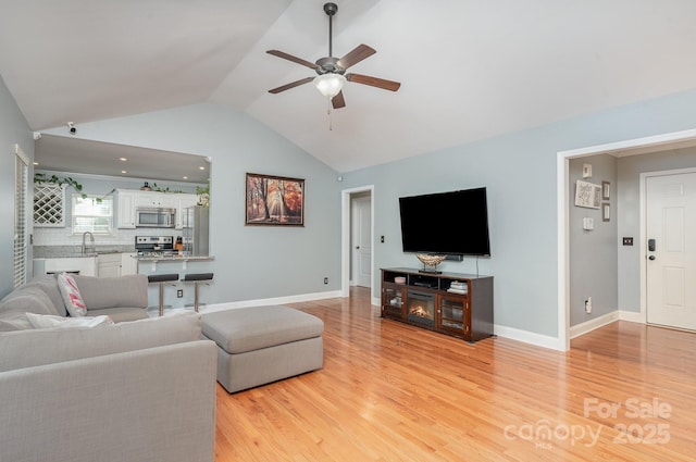 600 Old Hardin Rd, Dallas, NC 28034 - living room with baseboards, light wood-style flooring, lofted ceiling, and ceiling fan