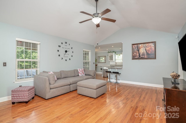 600 Old Hardin Rd, Dallas, NC 28034 - living area with light wood finished floors, a wealth of natural light, vaulted ceiling, and ceiling fan