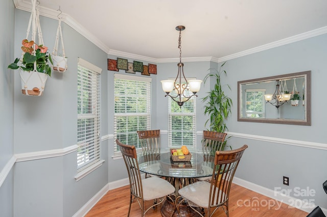 600 Old Hardin Rd, Dallas, NC 28034 - dining area featuring light wood finished floors, an inviting chandelier, plenty of natural light, and ornamental molding