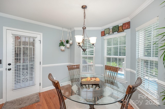 600 Old Hardin Rd, Dallas, NC 28034 - dining space with crown molding, wood finished floors, baseboards, and a notable chandelier
