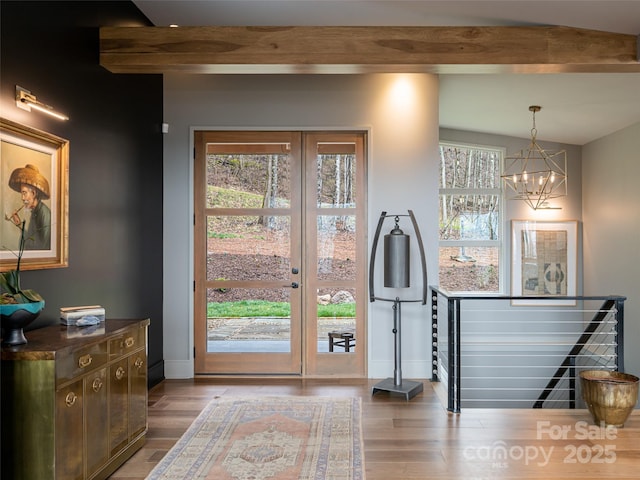 391 High Hickory Trl, Swannanoa, NC 28778 - doorway with beam ceiling, wood finished floors, baseboards, a chandelier, and french doors