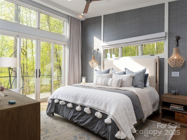 391 High Hickory Trl, Swannanoa, NC 28778 - bedroom featuring access to exterior and wallpapered walls
