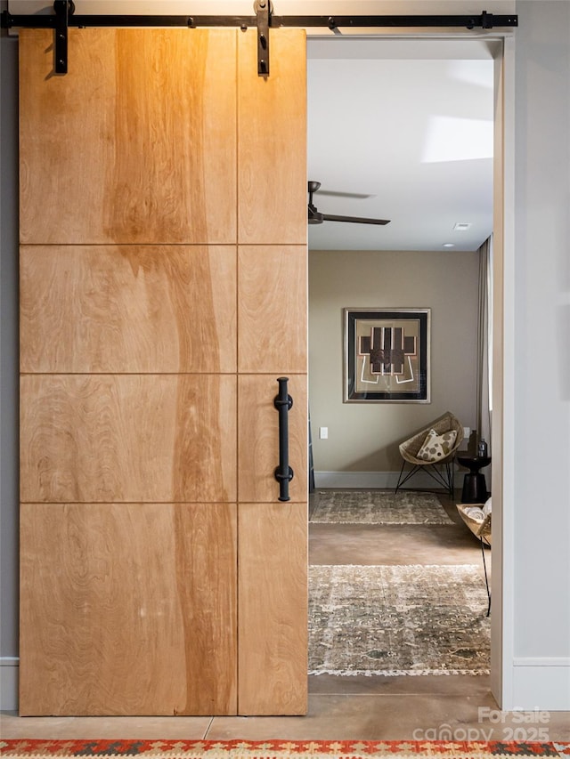 391 High Hickory Trl, Swannanoa, NC 28778 - hallway with a barn door and baseboards