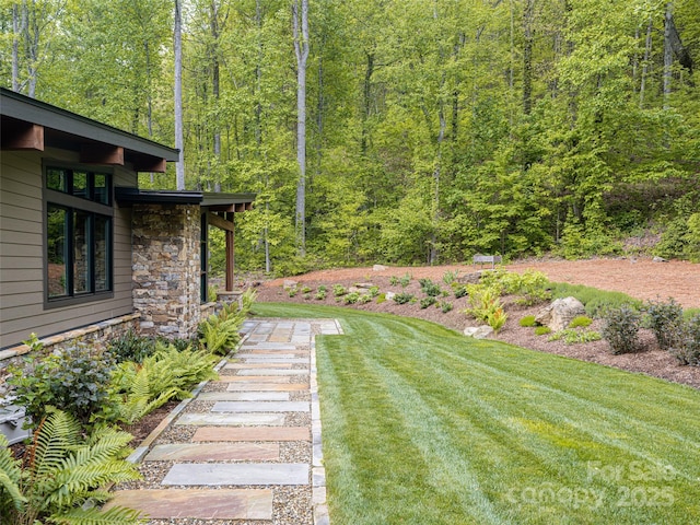 391 High Hickory Trl, Swannanoa, NC 28778 - view of green lawn featuring a forest view