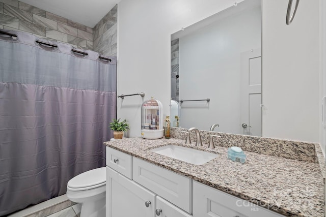 full bathroom featuring toilet, curtained shower, tile patterned flooring, and vanity