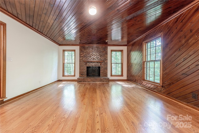 2310 Vestry Pl, Charlotte, NC 28270 - unfurnished living room featuring baseboards, a fireplace, wood finished floors, crown molding, and wood ceiling