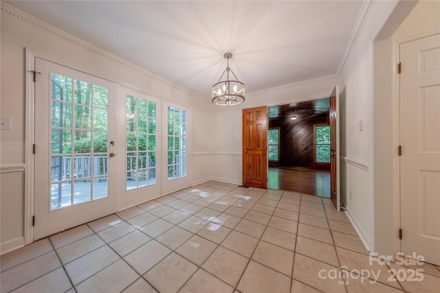 2310 Vestry Pl, Charlotte, NC 28270 - unfurnished dining area featuring a chandelier, light tile patterned floors, ornamental molding, and baseboards
