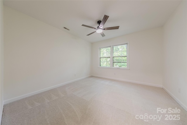 2310 Vestry Pl, Charlotte, NC 28270 - unfurnished room featuring baseboards, light colored carpet, and a ceiling fan