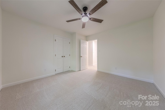2310 Vestry Pl, Charlotte, NC 28270 - unfurnished room with ceiling fan, baseboards, and light carpet