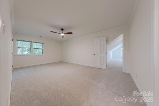 2310 Vestry Pl, Charlotte, NC 28270 - empty room with crown molding, light colored carpet, a ceiling fan, and baseboards
