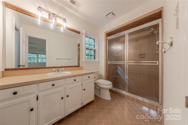 2310 Vestry Pl, Charlotte, NC 28270 - full bathroom featuring a shower stall, toilet, vanity, and tile patterned flooring