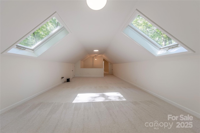 2310 Vestry Pl, Charlotte, NC 28270 - bonus room with a skylight, carpet flooring, lofted ceiling, and baseboards