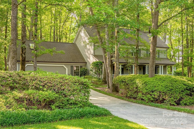 2310 Vestry Pl, Charlotte, NC 28270 - view of front of home with an attached garage, roof with shingles, and driveway