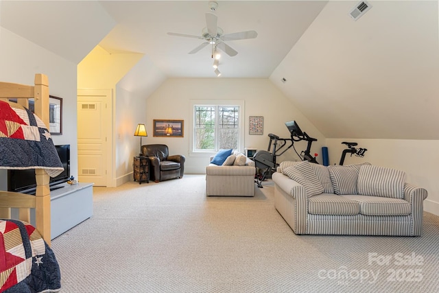 carpeted living room with a ceiling fan, visible vents, and lofted ceiling