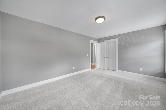 5633 Open Book Ln, Charlotte, NC 28270 - unfurnished bedroom featuring carpet and baseboards